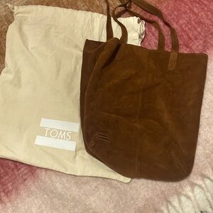 Tom’s never used suede bag with canvas cover included